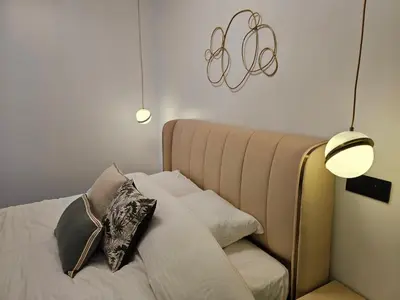 Un ou plusieurs lits dans un hébergement de l'établissement apt cosy proche arena bercy