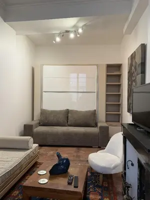 Coin salon dans l'établissement Appartement Rive Gauche