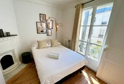 Un ou plusieurs lits dans un hébergement de l'établissement Appartement de charme - Place Victor Hugo - Paris 16e
