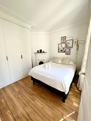 Un ou plusieurs lits dans un hébergement de l'établissement Appartement de charme - Place Victor Hugo - Paris 16e