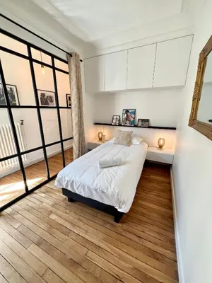 Un ou plusieurs lits dans un hébergement de l'établissement Appartement de charme - Place Victor Hugo - Paris 16e