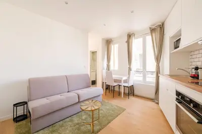 Cuisine ou kitchenette dans l'établissement Magic Apartment 4p Sacre Coeur