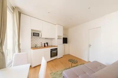Cuisine ou kitchenette dans l'établissement Magic Apartment 4p Sacre Coeur