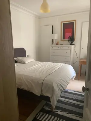 Un ou plusieurs lits dans un hébergement de l'établissement Parisien Solitaire -chambre d'hôte