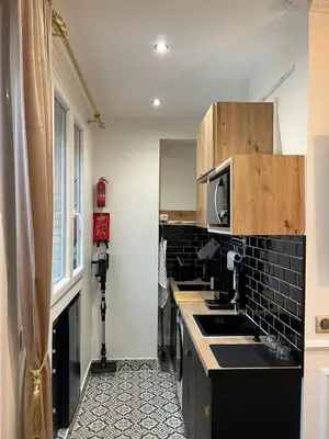 Cuisine ou kitchenette dans l'établissement Charming Stay