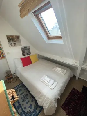Un ou plusieurs lits dans un hébergement de l'établissement Romantic Studio apt Historical Center Paris Marais