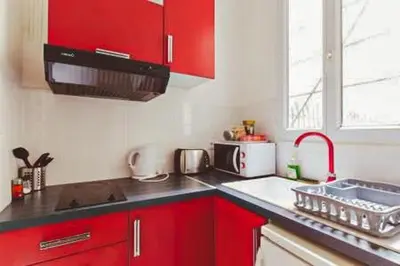 Cuisine ou kitchenette dans l'établissement Cosy 2 rooms Montmartre - Eugène Suë