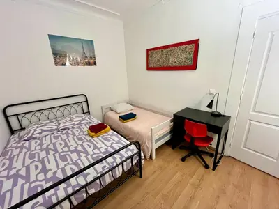Un ou plusieurs lits dans un hébergement de l'établissement Cosy 2 rooms Montmartre - Eugène Suë