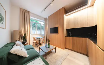 Télévision ou salle de divertissement dans l'établissement Apartment center of Paris with terrace by Studio Prestige