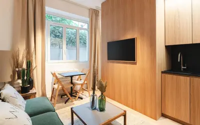 Télévision ou salle de divertissement dans l'établissement Apartment center of Paris with terrace by Studio Prestige