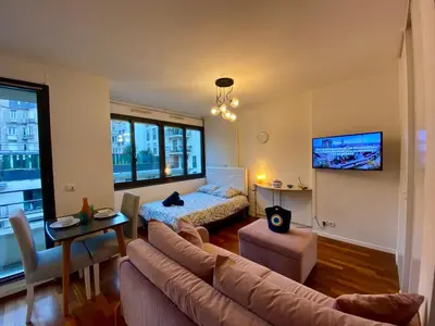 Télévision ou salle de divertissement dans l'établissement Appartement Passy PARIS