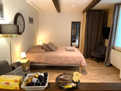 Un ou plusieurs lits dans un hébergement de l'établissement Lovely studio Le Marais