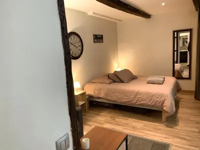Un ou plusieurs lits dans un hébergement de l'établissement Lovely studio Le Marais