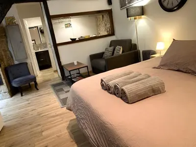 Un ou plusieurs lits dans un hébergement de l'établissement Lovely studio Le Marais