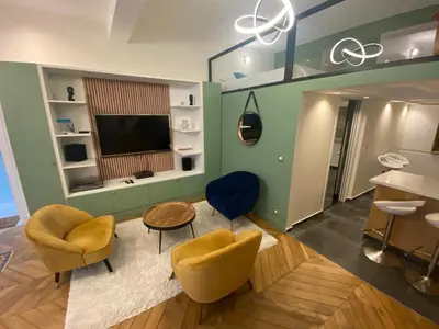 Télévision ou salle de divertissement dans l'établissement Loft Sud de Paris