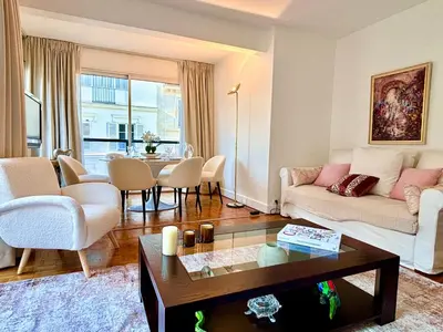 Coin salon dans l'établissement L'appartement Nicolo
