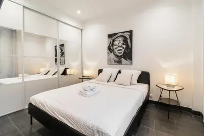 Un ou plusieurs lits dans un hébergement de l'établissement Appartement cosy à 2 min de Paris 16 ème
