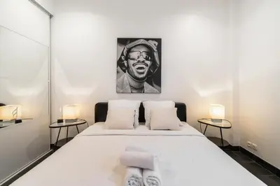 Un ou plusieurs lits dans un hébergement de l'établissement Appartement cosy à 2 min de Paris 16 ème