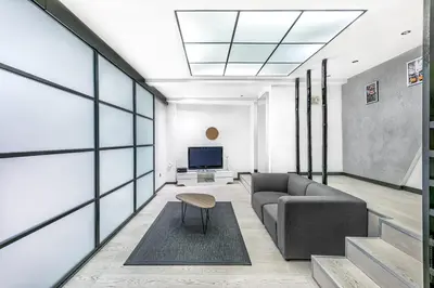 Coin salon dans l'établissement Loft Luxembourg - Vavin 1bdr by B'Your Home