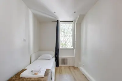 Un ou plusieurs lits dans un hébergement de l'établissement Bluestay 846 - Superbe appartement