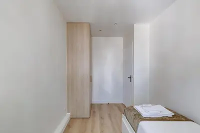 Un ou plusieurs lits dans un hébergement de l'établissement Bluestay 846 - Superbe appartement
