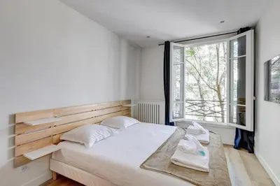 Un ou plusieurs lits dans un hébergement de l'établissement Bluestay 846 - Superbe appartement