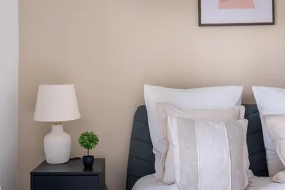 Un ou plusieurs lits dans un hébergement de l'établissement Appartement Cozy à Paris