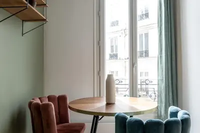Coin salon dans l'établissement Appartement Cozy à Paris