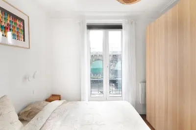 Un ou plusieurs lits dans un hébergement de l'établissement T2 Spacieux à Paris 19e - Parc de la Villette