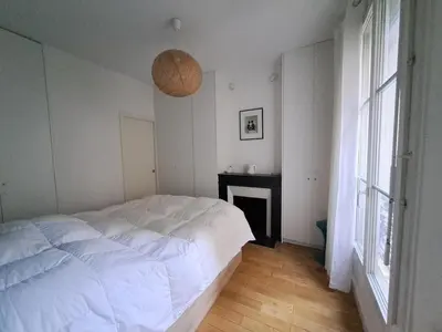 Un ou plusieurs lits dans un hébergement de l'établissement Appartement cosy pour 2 pers dans le 14ème