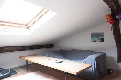 Coin salon dans l'établissement Charming studio for two in the 10th