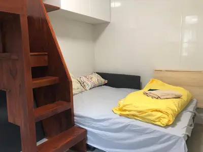 Un ou plusieurs lits dans un hébergement de l'établissement Le studio de Bastille Paris