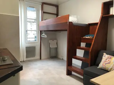 Un ou plusieurs lits dans un hébergement de l'établissement Le studio de Bastille Paris
