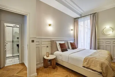 Un ou plusieurs lits dans un hébergement de l'établissement Amazing apartment Saint Germain des Pres with AC by Studio Prestige