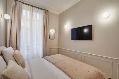 Un ou plusieurs lits dans un hébergement de l'établissement Amazing apartment Saint Germain des Pres with AC by Studio Prestige