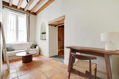 Coin salon dans l'établissement Appartement Triplex à Saint-Germain-des-Prés