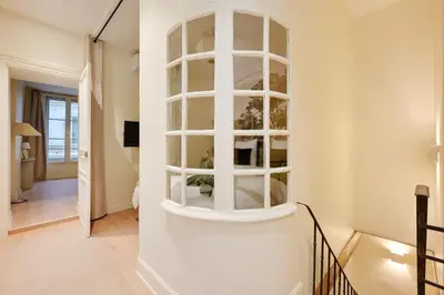 Un ou plusieurs lits dans un hébergement de l'établissement Appartement Triplex à Saint-Germain-des-Prés