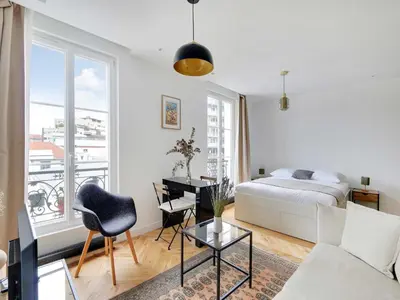 Un ou plusieurs lits dans un hébergement de l'établissement Charming studio - 2P - Canal Saint-Martin
