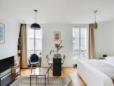 Un ou plusieurs lits dans un hébergement de l'établissement Charming studio - 2P - Canal Saint-Martin