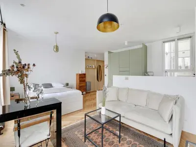 Un ou plusieurs lits dans un hébergement de l'établissement Charming studio - 2P - Canal Saint-Martin