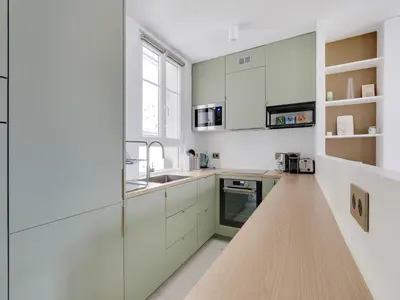 Cuisine ou kitchenette dans l'établissement Charming studio - 2P - Canal Saint-Martin
