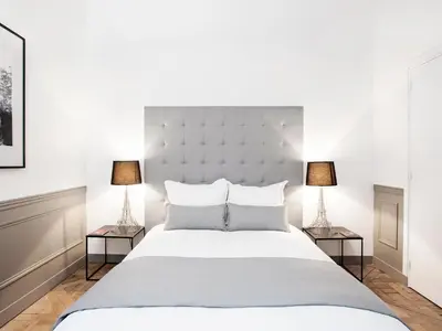 Un ou plusieurs lits dans un hébergement de l'établissement LivinParis - Luxury 2 Bedrooms Le Marais I