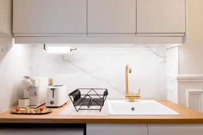 Cuisine ou kitchenette dans l'établissement Appartement élégant près de Bastille-Gare de Lyon