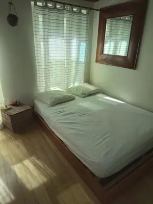 Un ou plusieurs lits dans un hébergement de l'établissement Appartement dans le Marais avec terrasse