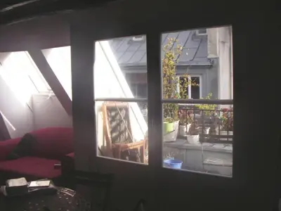 Coin salon dans l'établissement Appartement dans le Marais avec terrasse