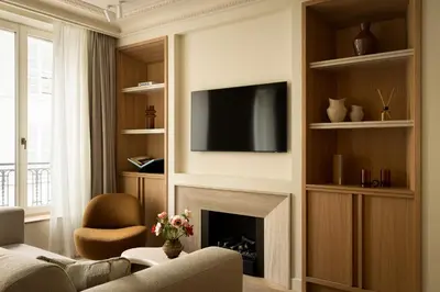 Télévision ou salle de divertissement dans l'établissement HIGHSTAY Maisons - Boétie