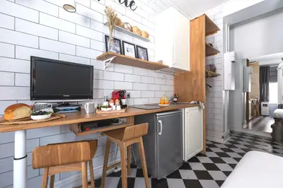 Cuisine ou kitchenette dans l'établissement Artisan Lofts Paris close Eiffel Tower