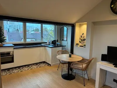 Cuisine ou kitchenette dans l'établissement Appartement proche PARIS