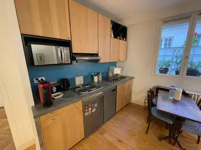 Cuisine ou kitchenette dans l'établissement Le Fleury