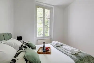 Un ou plusieurs lits dans un hébergement de l'établissement Le Bellanger - Duplex tout équipé proche Paris